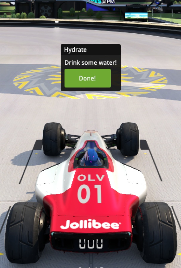 A pop-up window titled "Hydrate" with a message saying, "Drink some water!" and a green button labeled "Done". Below is the Trackmania car at a start block.